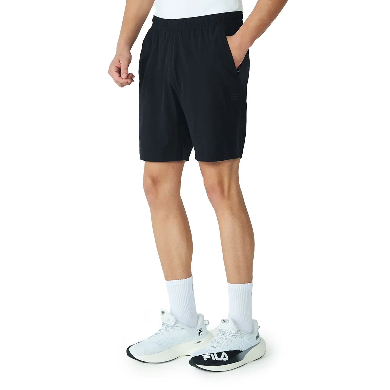 Bermuda Fila Zip V8 Masculina Preta vista lateral mostrando tecido e bolso